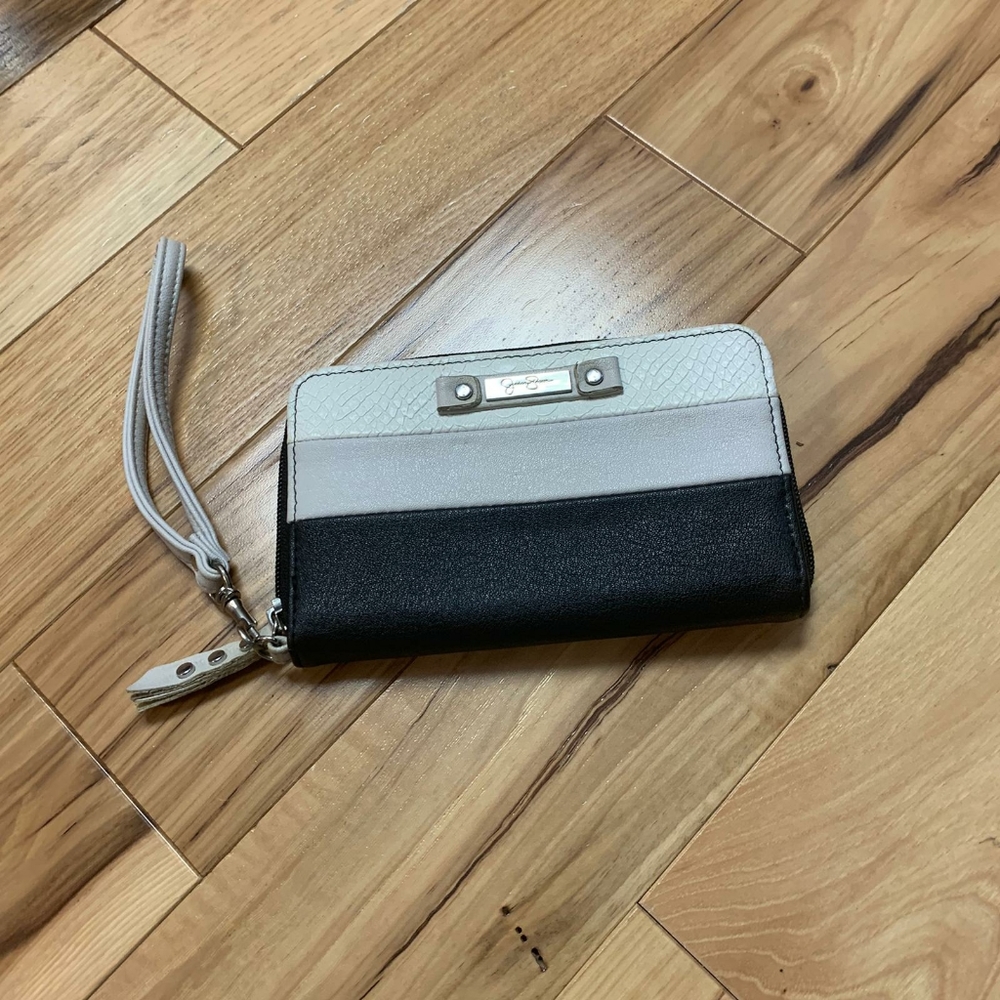 A Jessica Simpson wallet w/wrist strap